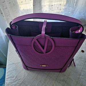 Vibrant Purple Tote with Textured Finish and Circular Emblem